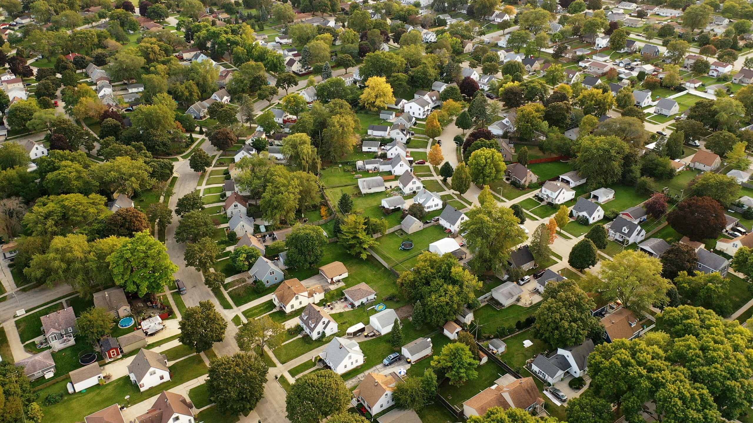 an aerial view of a neighborhood in the suburbs